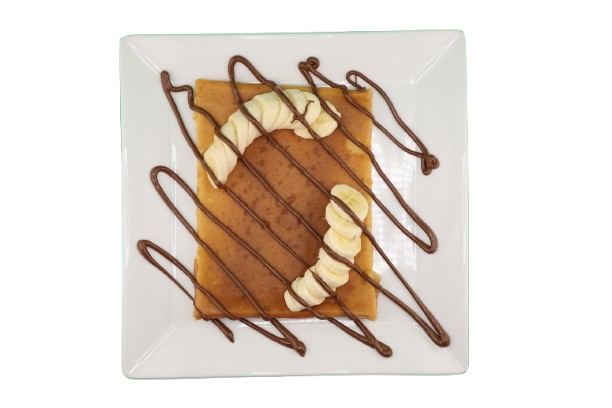Crepe topped with banana and chocolate hazelnut spread