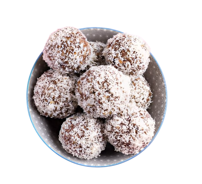 Coconut protein bites displayed on a plate