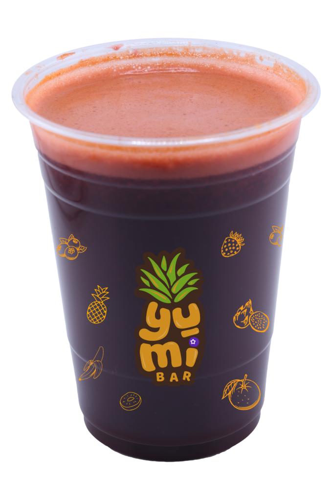 Mixed fruit juice with orange, strawberry, and apple in a cup