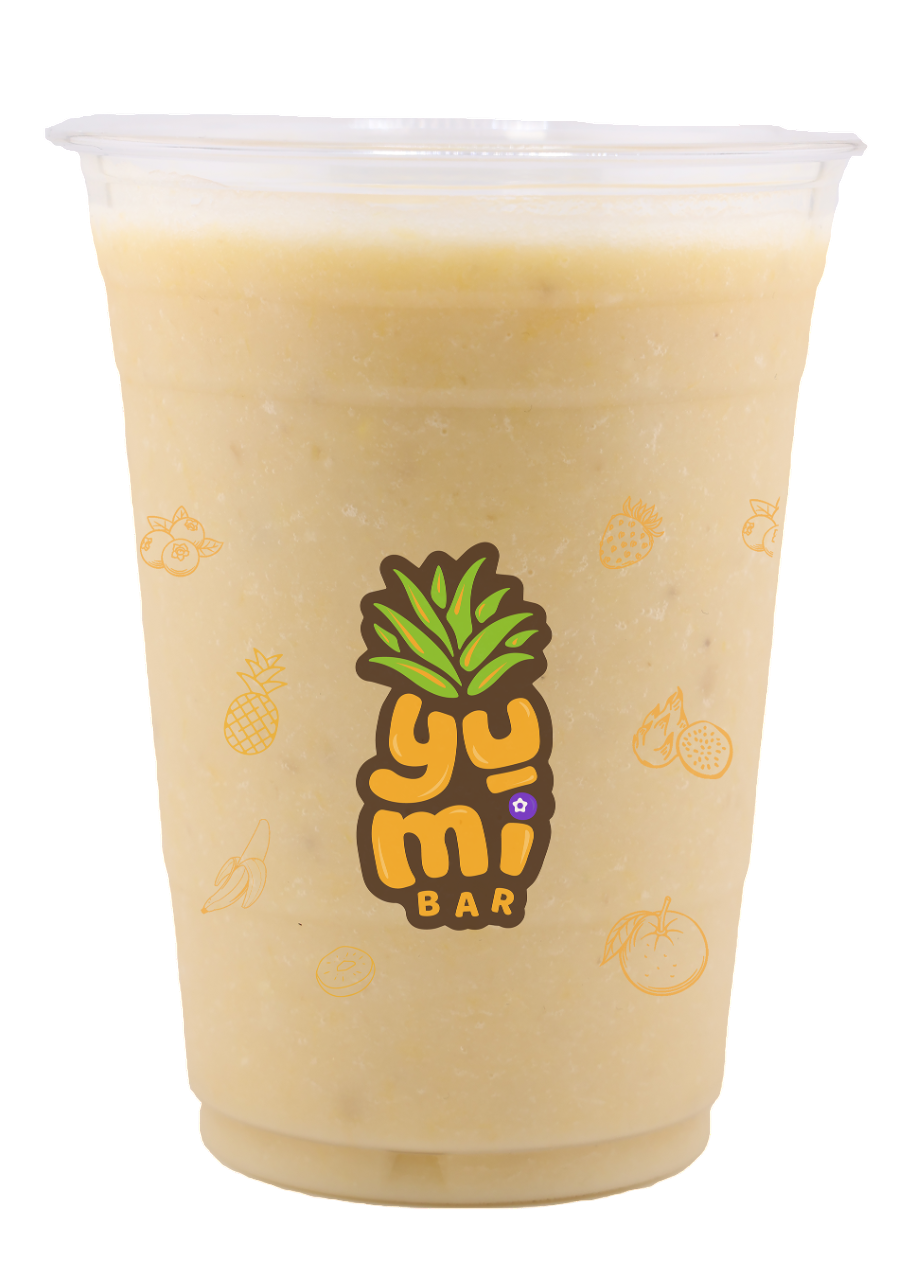 Orange smoothie with banana and pineapple in a cup